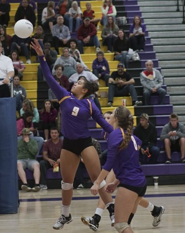 Aiyana Moore reaches in Division II opener against Tehachapi.